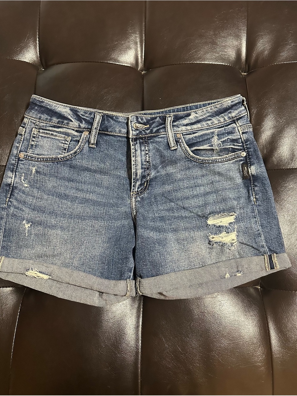 Silver Jeans Distressed Rolled Cuff Denim Shorts in Blue